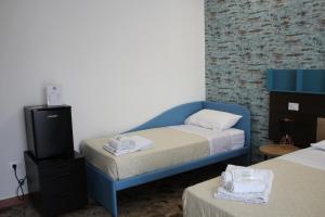 Postel nebo postele na pokoji v ubytování B&B DEGLI ANGELI