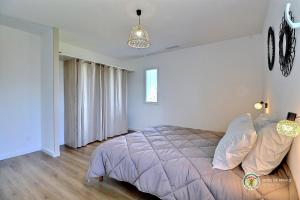 Ένα ή περισσότερα κρεβάτια σε δωμάτιο στο Les Villas du Soleil +42 φωτογραφίες