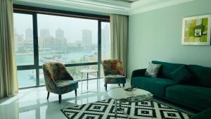 Area soggiorno di 2 BHK Townhouse at Pearl