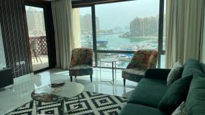 Area soggiorno di 2 BHK Townhouse at Pearl