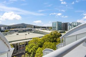 a view of a city from the balcony of a building at Private Room in a City Centre Duplex Apartment-3 in Canberra