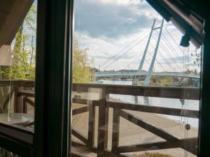 a view of a marina from a window at Villa Bella Italia III in Mikołajki