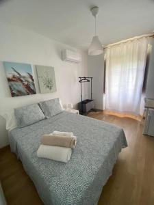 Postel nebo postele na pokoji v ubytování La Escalerita