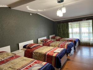Postel nebo postele na pokoji v ubytování Hotel Doko
