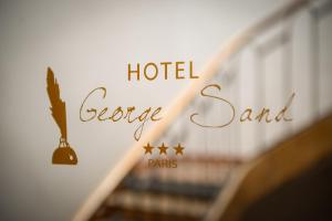 a hotel escape band sign on a wall with stairs at Hotel George Sand Opéra Paris in Paris +19 photos
