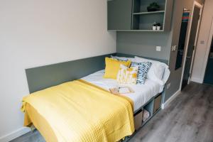 A bed or beds in a room at Canvas Point Campus Dublin Docklands