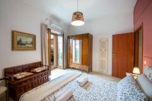 a bedroom with a large bed in a room at Casa Villani in Agerola