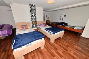 Postel nebo postele na pokoji v ubytování Blue Lake hostel + 37 fotografií