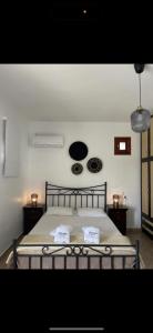 Cama ou camas em um quarto em SERRAS ROOMS