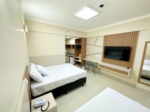 Cama ou camas em um quarto em diRoma Spazzio - Acesso Acqua Park