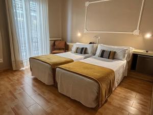 Postel nebo postele na pokoji v ubytování Hotel Celimar