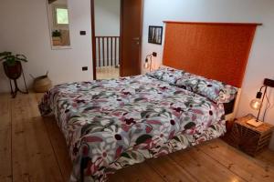 Postel nebo postele na pokoji v ubytování B&B Monte Adone