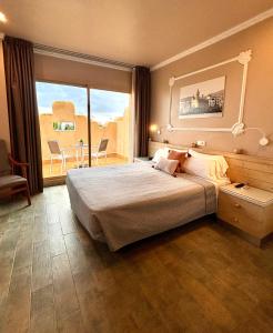 Postel nebo postele na pokoji v ubytování Hotel Celimar