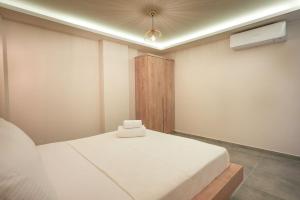 Postel nebo postele na pokoji v ubytování Soul House Kuşadası
