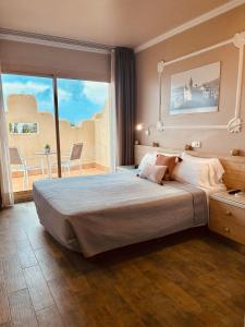 Postel nebo postele na pokoji v ubytování Hotel Celimar