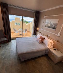Postel nebo postele na pokoji v ubytování Hotel Celimar
