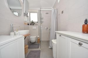 Koupelna v ubytování Apartman Lora