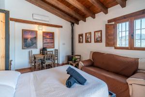 Postel nebo postele na pokoji v ubytování Complejo Rural El Mirador + 37 fotografií