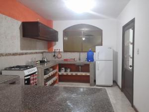 Kuchyň nebo kuchyňský kout v ubytování SANPE Apartment