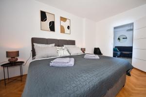 Postel nebo postele na pokoji v ubytování Apartman Lora