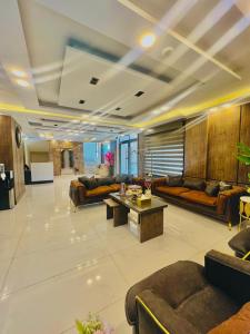 Posezení v ubytování رويال جروب اربد Royal Group Hotel