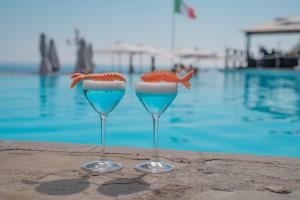 Bazén v ubytování Hotel Porto Roca nebo v jeho okolí