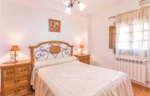 A bed or beds in a room at 8 Bedroom Lovely Home In Iznájar