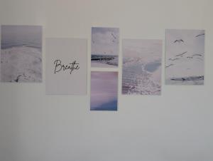 a group of four pictures with the words fragile at Villa Dina Apartments in Almyrida