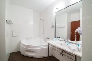 Kúpeľňa v ubytovaní Hotel Hanza