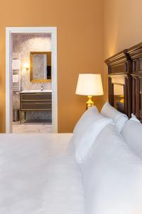 A bed or beds in a room at Antico Portego