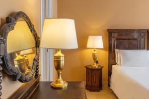 A bed or beds in a room at Antico Portego
