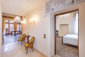 A bed or beds in a room at Antico Portego