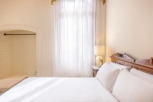 A bed or beds in a room at Antico Portego