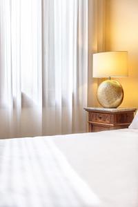 A bed or beds in a room at Antico Portego