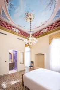 A bed or beds in a room at Antico Portego