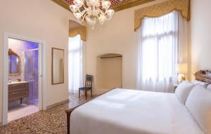 A bed or beds in a room at Antico Portego