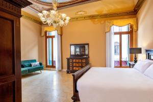 A bed or beds in a room at Antico Portego