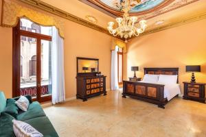 A bed or beds in a room at Antico Portego