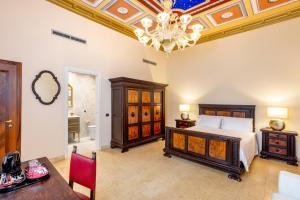 A bed or beds in a room at Antico Portego