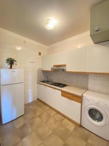 Kuchyň nebo kuchyňský kout v ubytování Residence Luna