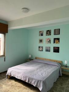 Postel nebo postele na pokoji v ubytování B&B il riccio