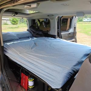a bed in the back of a van at Mini Camper Honda Element in Guatemala