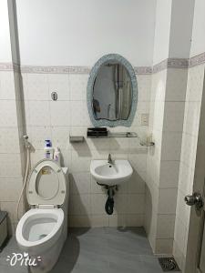 Salle de bains dans l'établissement Khách Sạn An Chi