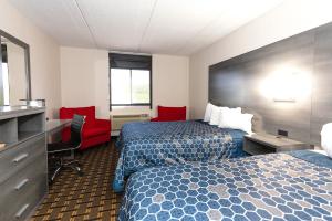 Postel nebo postele na pokoji v ubytování Coratel Inn & Suites by Jasper Mankato