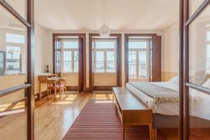 Ένα ή περισσότερα κρεβάτια σε δωμάτιο στο Alado Guesthouse