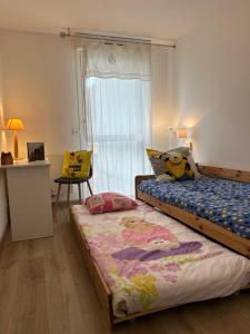 Postel nebo postele na pokoji v ubytování Appartement Annecy Green