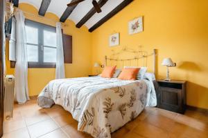 Postel nebo postele na pokoji v ubytování Masia Castellvi B&B + 27 fotografií
