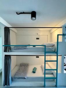 Postel nebo postele na pokoji v ubytování Canggu Central Hostel