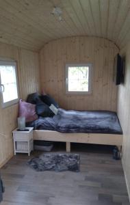 Ένα ή περισσότερα κρεβάτια σε δωμάτιο στο Rhumeblume