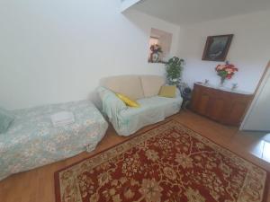 Łóżko lub łóżka w pokoju w obiekcie Habitaciones Casa Santander Playa Valdenoja